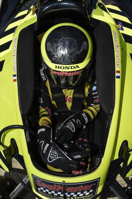 Sebastien Bourdais sits in his No. 18 SealMaster Honda on pit lane prior to qualifications for the Honda Indy Grand Prix of Alabama -- Photo by: Chris Owens