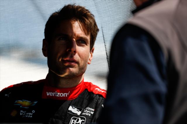 Will Power chats with team engineers in his pit stand prior to practice for the Honda Indy Grand Prix of Alabama -- Photo by: Joe Skibinski