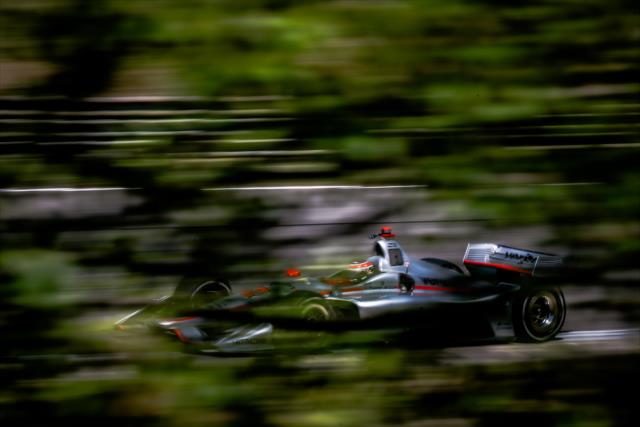 Will Power sails out of Turn 3 during practice for the Honda Indy Grand Prix of Alabama -- Photo by: Joe Skibinski