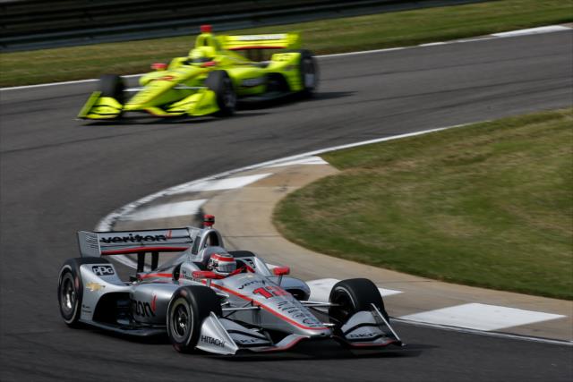 Will Power and Simon Pagenaud streak through the Turn 5 hairpin during qualifications for the Honda Indy Grand Prix of Alabama -- Photo by: Joe Skibinski