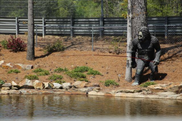 The Bigfoot statue looking for a little fishing luck at Barber Motorsports Park -- Photo by: Matt Fraver