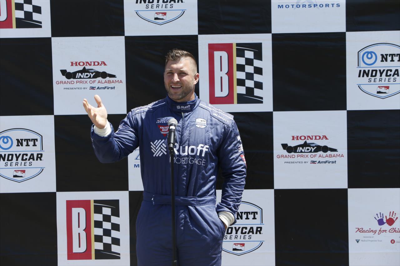 Tim Tebow prior to riding in the Ruoff Fastest Seat in Sports - Honda Indy Grand Prix of Alabama - By: Chris Jones -- Photo by: Chris Jones