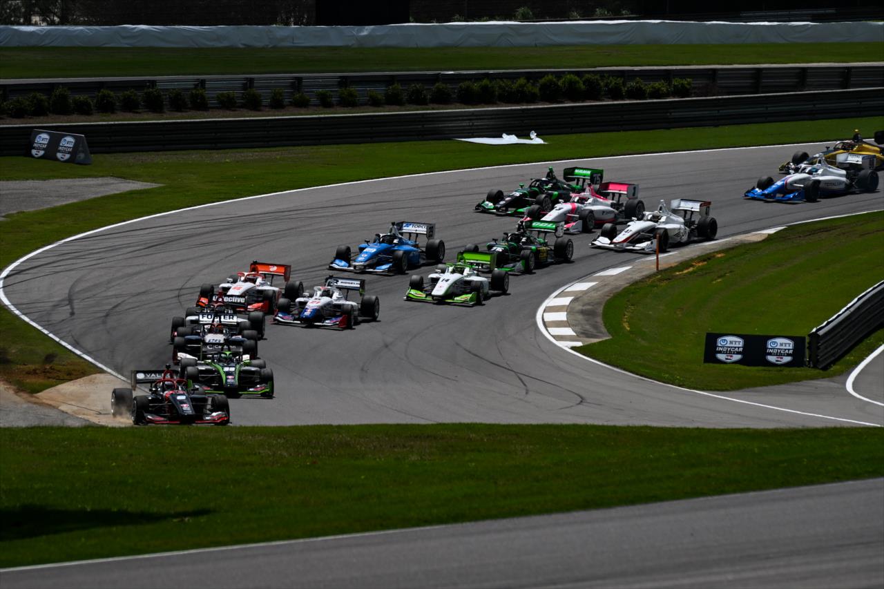 Christian Rasmusssen leads the field at the INDY NXT By Firestone Grand Prix of Alabama - By: James Black -- Photo by: James  Black