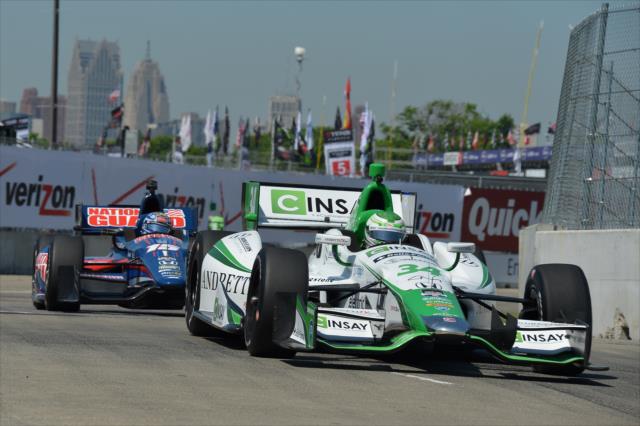 Carlos Munoz and Graham Rahal exit Turn 2 during practice for the Chevrolet Dual In Detroit -- Photo by: Chris Owens