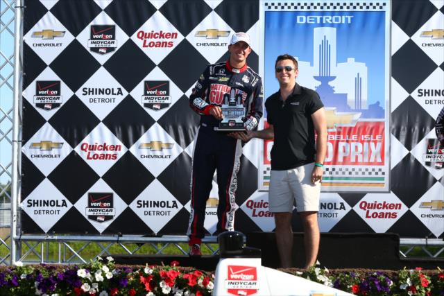 Graham Rahal accepts his 2nd place trophy for Race 1 of the Chevrolet Indy Dual in Detroit -- Photo by: Chris Jones