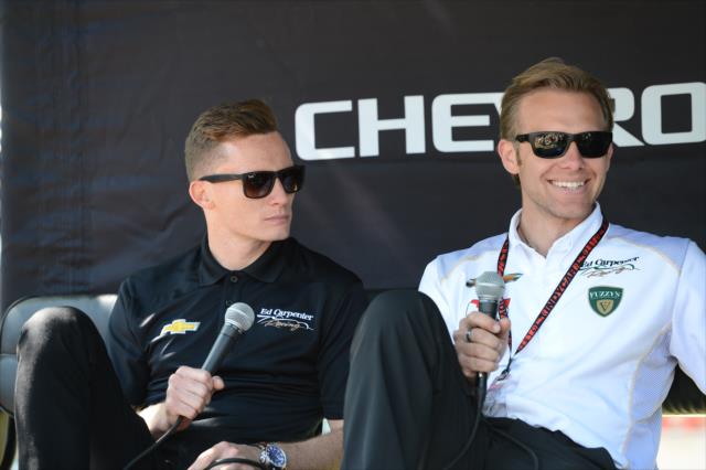 Mike Conway and Ed Carpenter chat with fans during a Q&A session in the Belle Isle Fan Village -- Photo by: Chris Owens