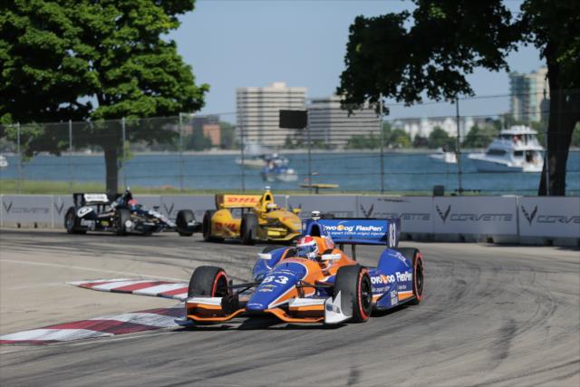 Charlie Kimball leads Ryan Hunter-Reay and Tony Kanaan into Turn 7 during Race 1 of the Chevrolet Indy Dual in Detroit -- Photo by: Joe Skibinski