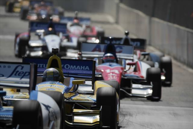 The field screams down into Turn 3 during Race 1 of the Chevrolet Indy Dual in Detroit -- Photo by: Joe Skibinski