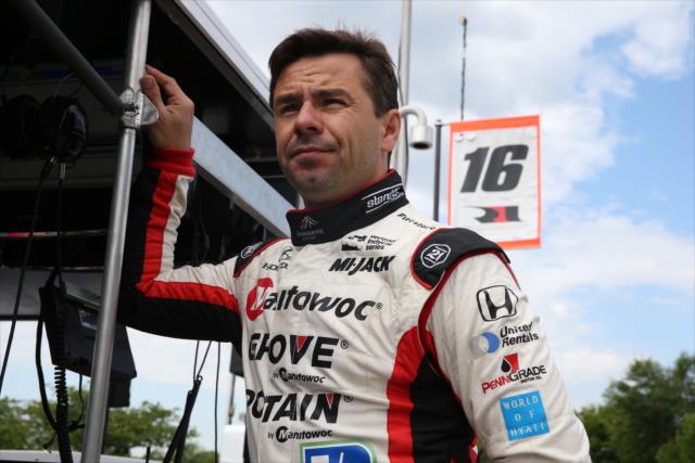 Oriol Servia looks down pit lane prior to practice for the Chevrolet Detroit Grand Prix -- Photo by: Chris Jones