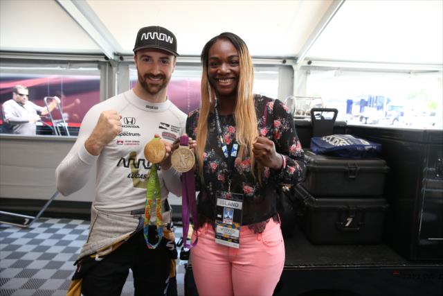 James Hinchcliffe and Olympic Gold Medalist Claressa Shields in the Schmidt Peterson Motorsports paddock -- Photo by: Chris Jones