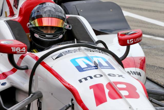 Esteban Gutierrez sits in his No. 18 Unifin Honda on pit lane prior to practice for the Chevrolet Detroit Grand Prix -- Photo by: Chris Jones