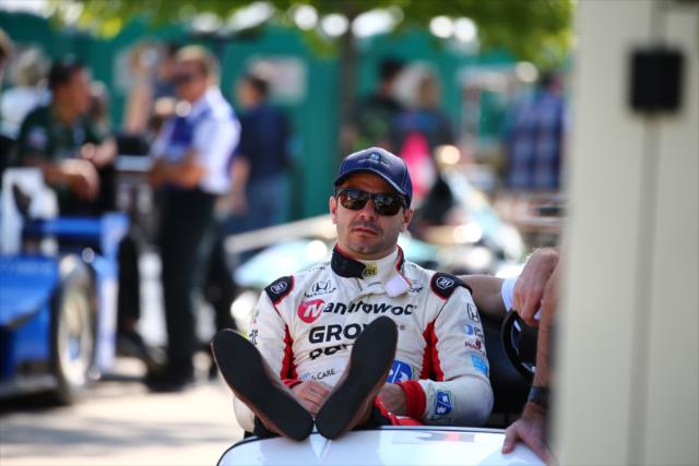 Oriol Servia relaxes along pit lane prior to qualifications for Race 1 of the Chevrolet Detroit Grand Prix -- Photo by: Bret Kelley