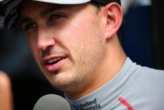Graham Rahal is interviewed on pit lane after winning the pole position for Race 1 of the Chevrolet Detroit Grand Prix -- Photo by: Bret Kelley