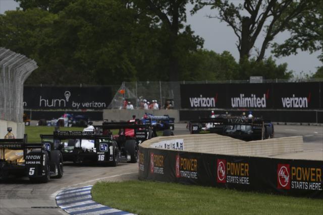 The field streams through Turns 1-2 during Race 1 of the Chevrolet Detroit Grand Prix -- Photo by: Bret Kelley