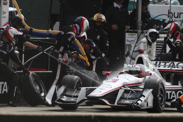 Helio Castroneves comes in for tires and fuel on pit lane during Race 1 of the Chevrolet Detroit Grand Prix -- Photo by: Bret Kelley