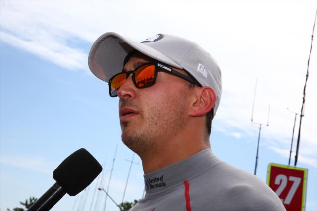 Graham Rahal is interviewed along pit lane after winning the pole for Race 1 of the Chevrolet Detroit Grand Prix -- Photo by: Bret Kelley