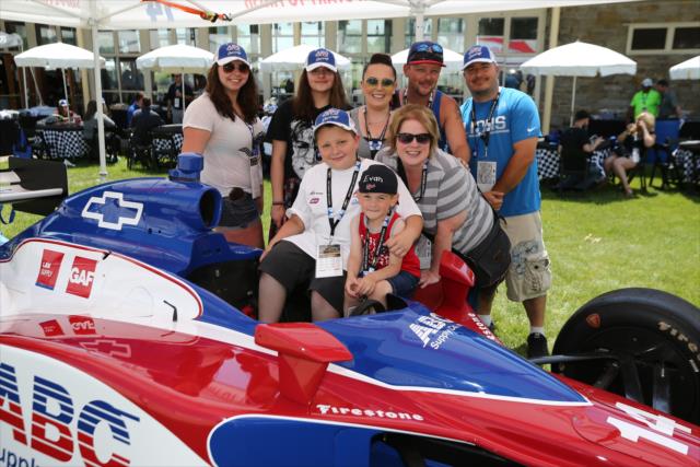 Fans check out the ABC Supply showcar in the INDYCAR Fan Village in Belle Isle Park in Detroit -- Photo by: Chris Jones