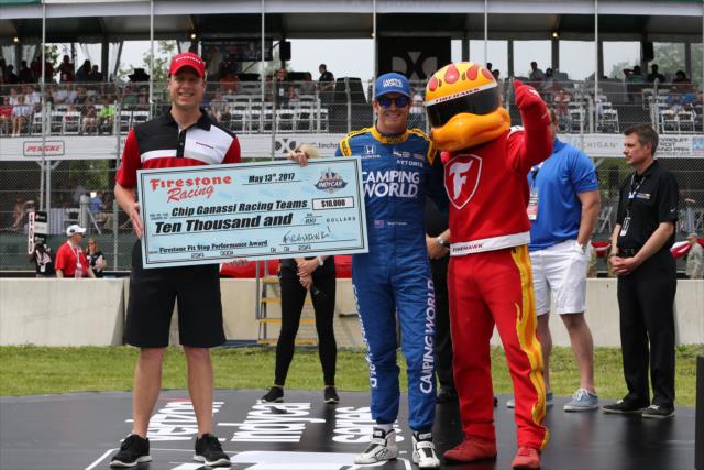 Scott Dixon accepts the Firestone Pit Stop Performance Award on behalf of Chip Ganassi Racing for their performance in the INDYCAR Grand Prix -- Photo by: Chris Jones