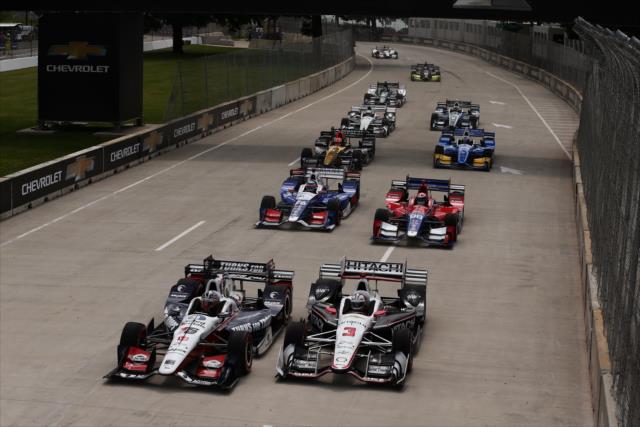 Graham Rahal and Helio Castroneves lead the field to the green flag to start Race 1 of the Chevrolet Detroit Grand Prix -- Photo by: Chris Jones