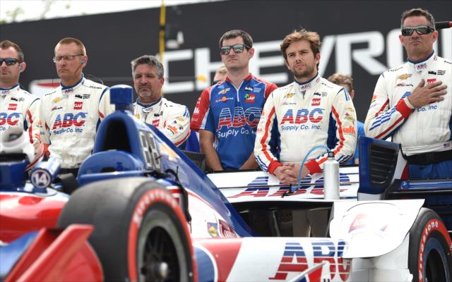 Carlos Munoz joins his A.J. Foyt Racing crew during the National Anthems prior to Race 1 of the Chevrolet Detroit Grand Prix -- Photo by: Chris Owens