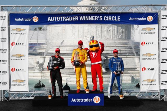 The podium of Ryan Hunter-Reay, Will Power, and Ed Jones with their trophies in Victory Circle following Race 2 of the Chevrolet Detroit Grand Prix at Belle Isle Park -- Photo by: Joe Skibinski