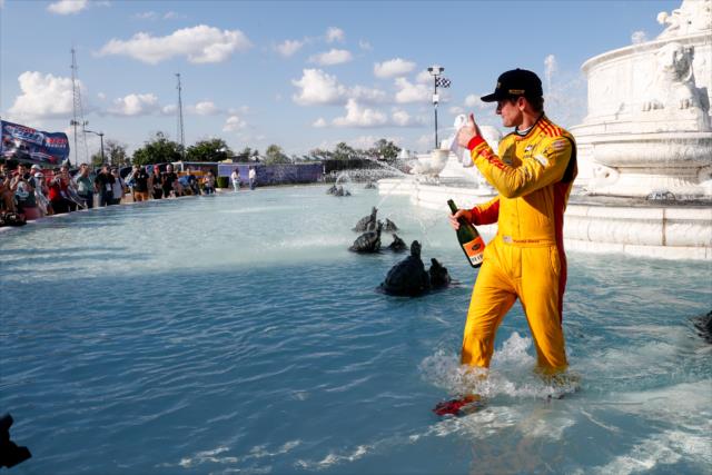 Ryan Hunter-Reay celebrates in the James Scott Memorial Fountain after winning Race 2 of the Chevrolet Detroit Grand Prix at Belle Isle Park -- Photo by: Joe Skibinski