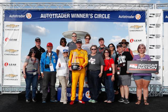 Ryan Hunter-Reay celebrates with members of INDYCAR Nation in Victory Circle after winning Race 2 of the Chevrolet Detroit Grand Prix at Belle Isle Park -- Photo by: Joe Skibinski
