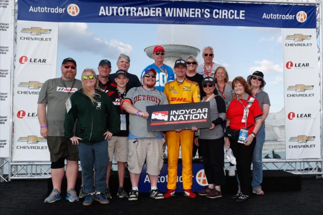 Ryan Hunter-Reay with members of INDYCAR Nation in Victory Circle after winning Race 2 of the Chevrolet Detroit Grand Prix at Belle Isle Park -- Photo by: Joe Skibinski