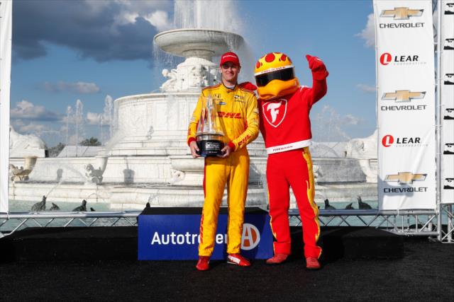 Ryan Hunter-Reay with the Firestone Firehawk in Victory Circle after winning Race 2 of the Chevrolet Detroit Grand Prix at Belle Isle Park -- Photo by: Joe Skibinski