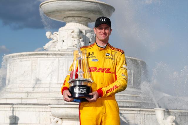 Ryan Hunter-Reay with his Winner's Trophy in Victory Circle after winning Race 2 of the Chevrolet Detroit Grand Prix at Belle Isle Park -- Photo by: Joe Skibinski