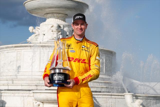 Ryan Hunter-Reay with his winner's trophy in Victory Circle after winning Race 2 of the Chevrolet Detroit Grand Prix at Belle Isle Park -- Photo by: Joe Skibinski