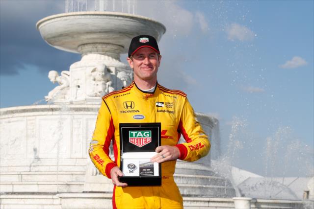 Ryan Hunter-Reay his TAG Heuer Winner's Watch in Victory Circle after winning Race 2 of the Chevrolet Detroit Grand Prix at Belle Isle Park -- Photo by: Joe Skibinski