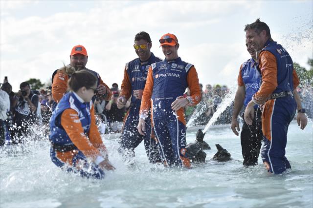 Scott Dixon celebrates with his crew in the fountain after winning race 2 of the Chevrolet Detroit Grand Prix -- Photo by: Chris Owens