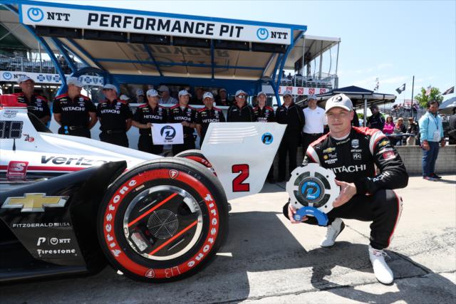 Josef Newgarden with the NTT Data P1 Award after winning the pole position for Race 2 of the Chevrolet Detroit Grand Prix at Belle Isle Park -- Photo by: Joe Skibinski