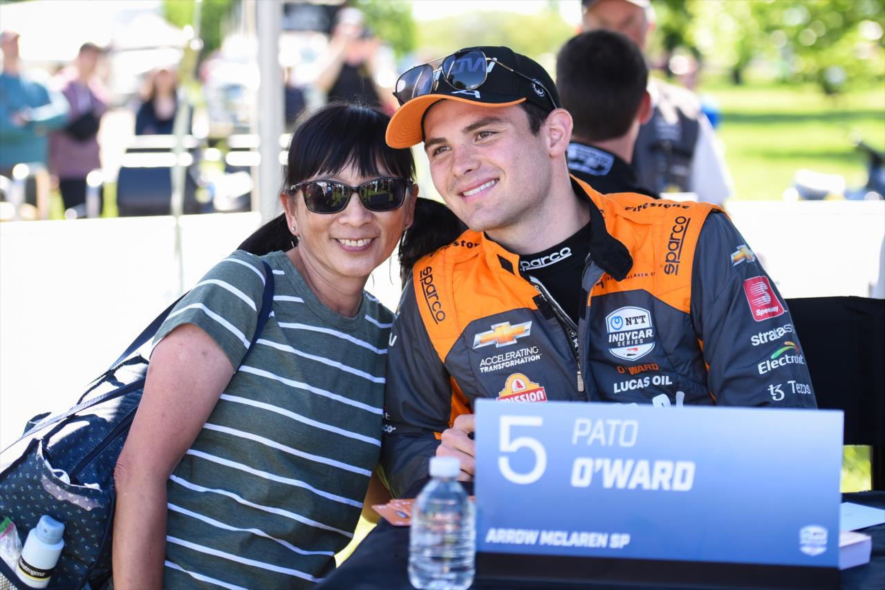 Pato O'Ward and fan - Chevrolet Detroit Grand Prix - By: James Black -- Photo by: James  Black