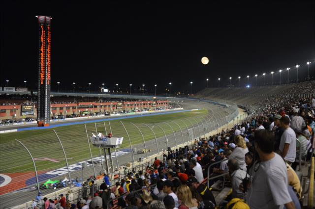 The crowd watches the action of the MAVTV 500 at Auto Club Speedway -- Photo by: John Cote