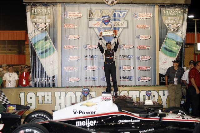 Will Power raises his winners trophy for the MAVTV 500 at Auto Club Speedway -- Photo by: Richard Dowdy