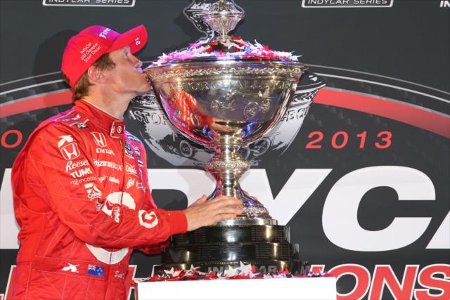 Scott Dixon kisses the Astor Challenge Cup after winning the 2013 IZOD IndyCar Series championship -- Photo by: Chris Jones
