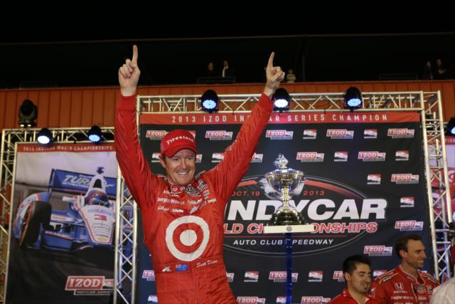 Scott Dixon celebrates on stage as the 2013 IZOD IndyCar Series champion -- Photo by: Chris Jones