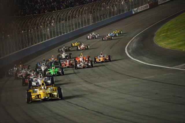The field for the MAVTV 500 makes their way into Turn 1 at Auto Club Speedway -- Photo by: Chris Owens