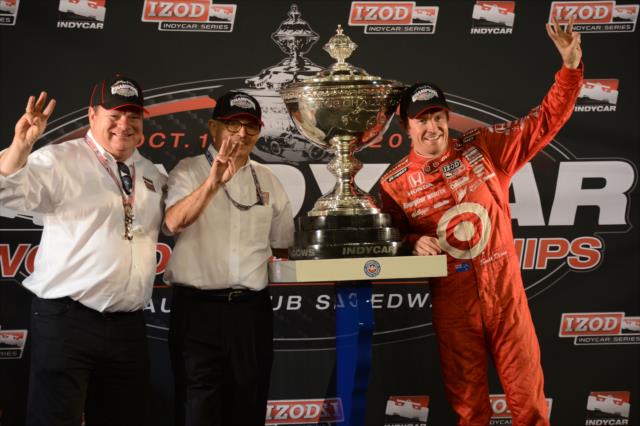 Chip Ganassi, Mike Hull, and Scott Dixon celebrate their 2013 IZOD IndyCar Series championship after the MAVTV 500 at Auto Club Speedway -- Photo by: Chris Owens