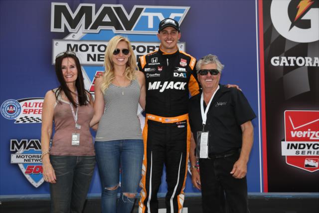 Graham Rahal with John, Laurie, and Courtney Force in Victory Lane following his win in the MAVTV 500 at Auto Club Speedway -- Photo by: Chris Jones
