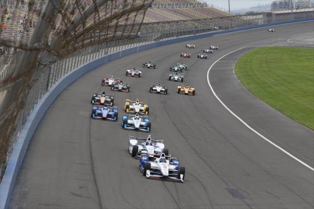 Helio Castroneves leads the field down the frontstretch during the MAVTV 500 at Auto Club Speedway -- Photo by: Chris Jones