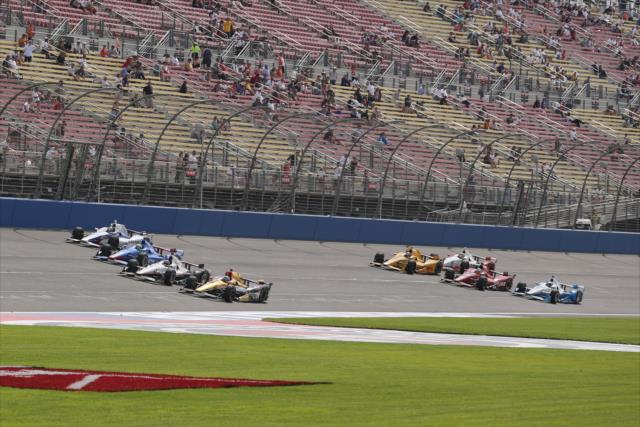 The field goes four-wide and three-wide during the MAVTV 500 at Auto Club Speedway -- Photo by: Chris Jones