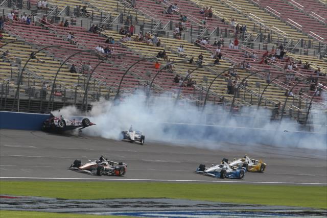 Takuma Sato and Will Power make contact along the frontstretch bringing out a late caution during the MAVTV 500 at Auto Club Speedway -- Photo by: Chris Jones