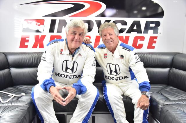Jay Leno and Mario Andretti sit in the INDYCAR Experience Lounge prior to their two-seater ride at Auto Club Speedway -- Photo by: Chris Owens