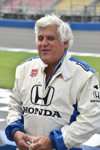 Jay Leno on pit lane following his two-seater ride at Auto Club Speedway by Mario Andretti -- Photo by: Chris Owens