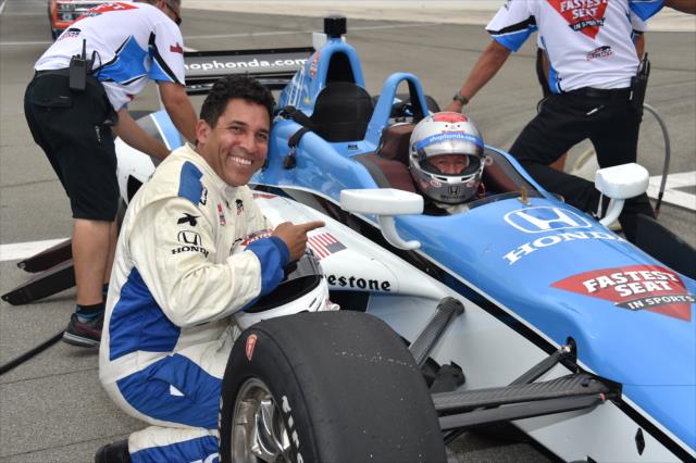 Actor Oscar Nunez with Mario Andretti following their two-seater ride at Auto Club Speedway -- Photo by: Chris Owens