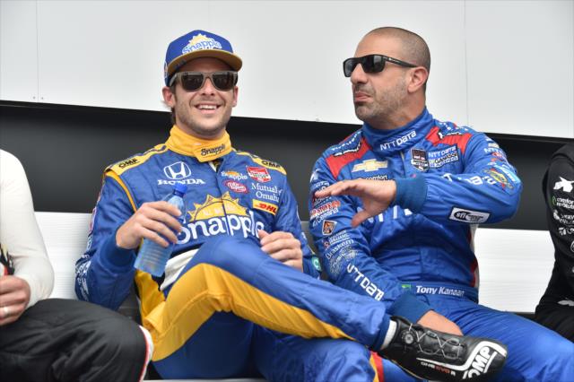 Marco Andretti and Tony Kanaan chat backstage during pre-race festivities for the MAVTV 500 at Auto Club Speedway -- Photo by: Chris Owens