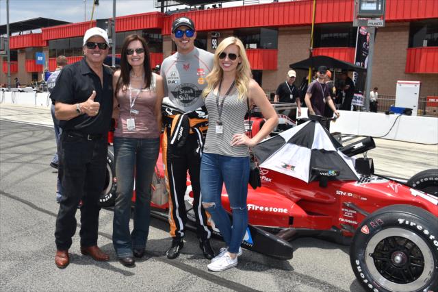 Graham Rahal, his fiance Courtney Force, and John and Laurie Force on pit lane prior to the MAVTV 500 at Auto Club Speedway -- Photo by: Chris Owens